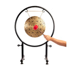 Front view of Buddha's Enlightenment Gong on a stable black stand.