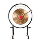 Sri Yantra Chakra Gong with mallet resting on the stand.